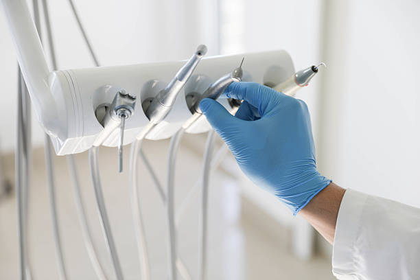 Professional Tooth Extraction technician working in Medina, WA